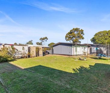 3-Bedroom Home with Dual Sheds, Minutes from Beach & Schools - Photo 4