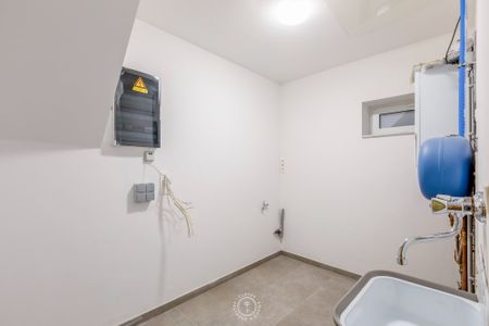 Ruim en energiezuinig gelijkvloers appartement op wandelafstand van de Schelde - Photo 3