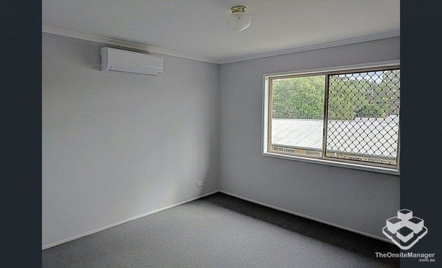 Spacious 2-Bedroom Unit in Logan Central! - Photo 1