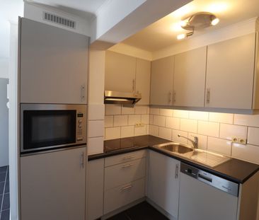 Een appartement op de 1ste verdieping achteraan met 1 slaapkamer en... - Photo 3