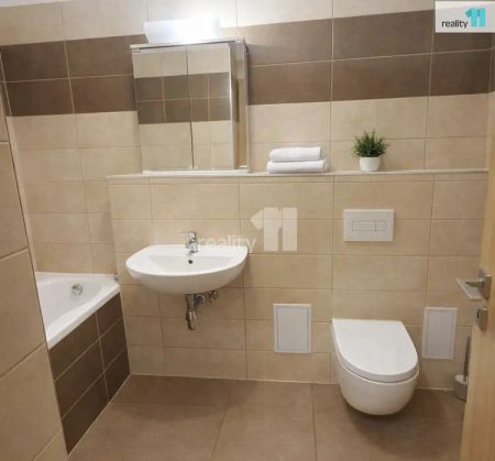 Byt 1kk s balkonem a parkovacím stáním, novostavba domu v Hostivicích ul. Ječná - Photo 4