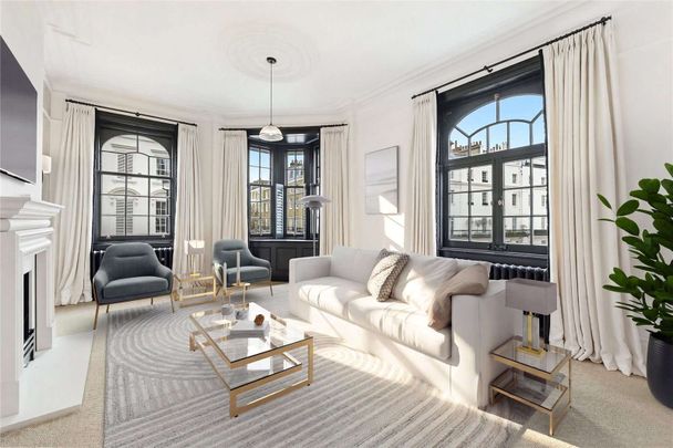 A beautifully presented two bedroom, first floor apartment with high ceilings and an abundance of natural light throughout. - Photo 1