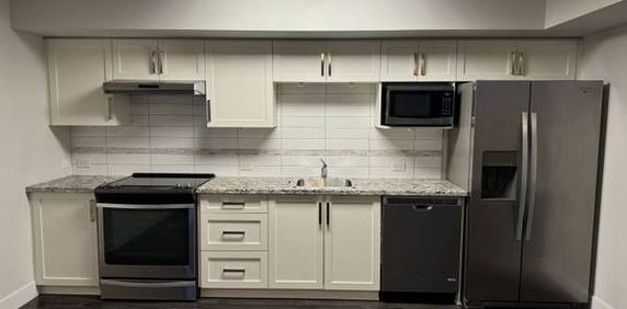 ***Spacious One Bedroom Legal Suite*** - Photo 2