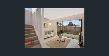 MODERN TOWNHOUSE READY TO LEASE! - Photo 2