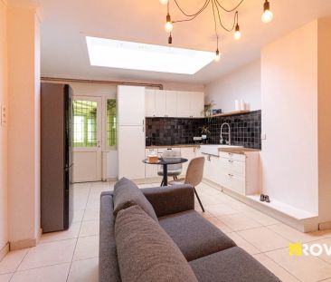 Verzorgde rijwoning met grote tuin! - Photo 2