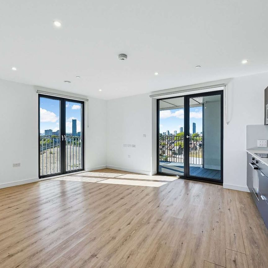 Modern two-bedroom apartment with open-plan living, private balcony, contemporary interiors and access to a communal roof terrace. - Photo 1