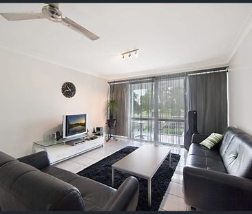 FIRST FLOOR UNIT WITH GOLF COURSE VIEWS & FANTASTIC BREEZES! - Photo 2