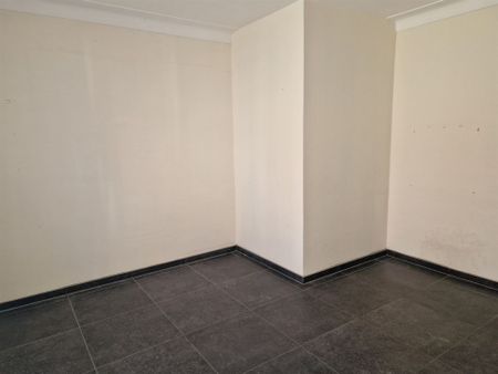 Gelijkvloers appartement met 4 slaapkamers en tuin - Photo 3