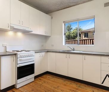 Two bedroom unit in great location - Photo 1