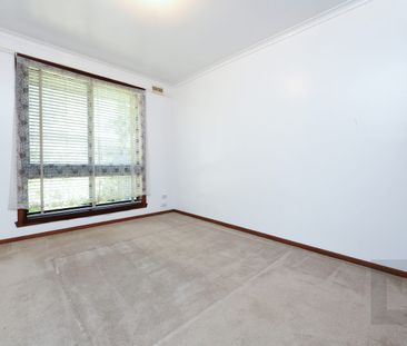 Perfectly Positioned 2-Bedroom Unit - Photo 1