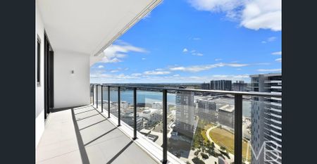 PENTHOUSE-STYLE APARTMENT WITH 270 DEGREE WATER & CITY VIEWS - Photo 4