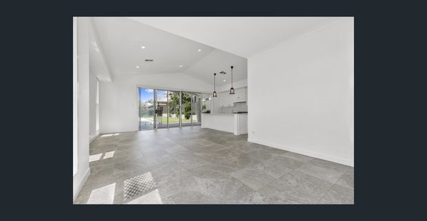 STUNNING HAMPTONS STYLE HOME WITH POOL - Photo 1