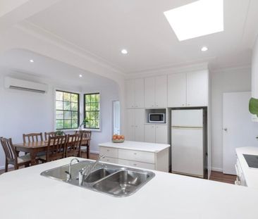 Three-Bedroom Home in the Heart of Belmont North - Photo 6