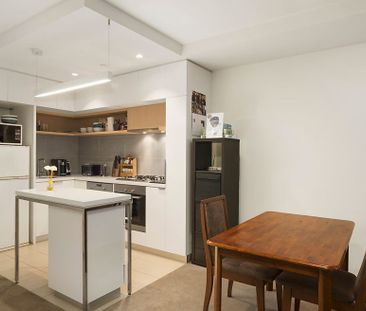 Fully Furnished One Bedroom Apartment with Private Courtyard - Photo 3