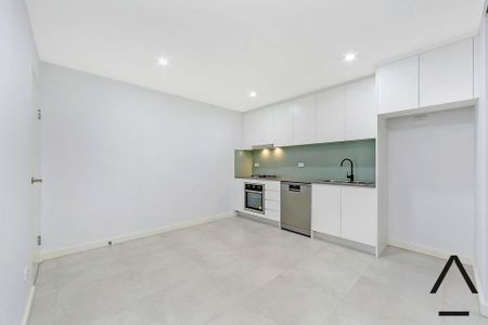 Modern Masterpiece – Split Level Two Bedroom Townhouse Style Apartment With One and a Half Bathrooms - Photo 5