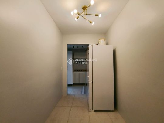 Casa em Condomínio com 2 quartos e 50m² para alugar em Moinhos de Vento, Canoas. - Photo 1