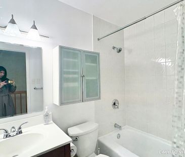 GORGEOUS 2-BEDROOM CONDO WITH MODERN FINISHES - Photo 1