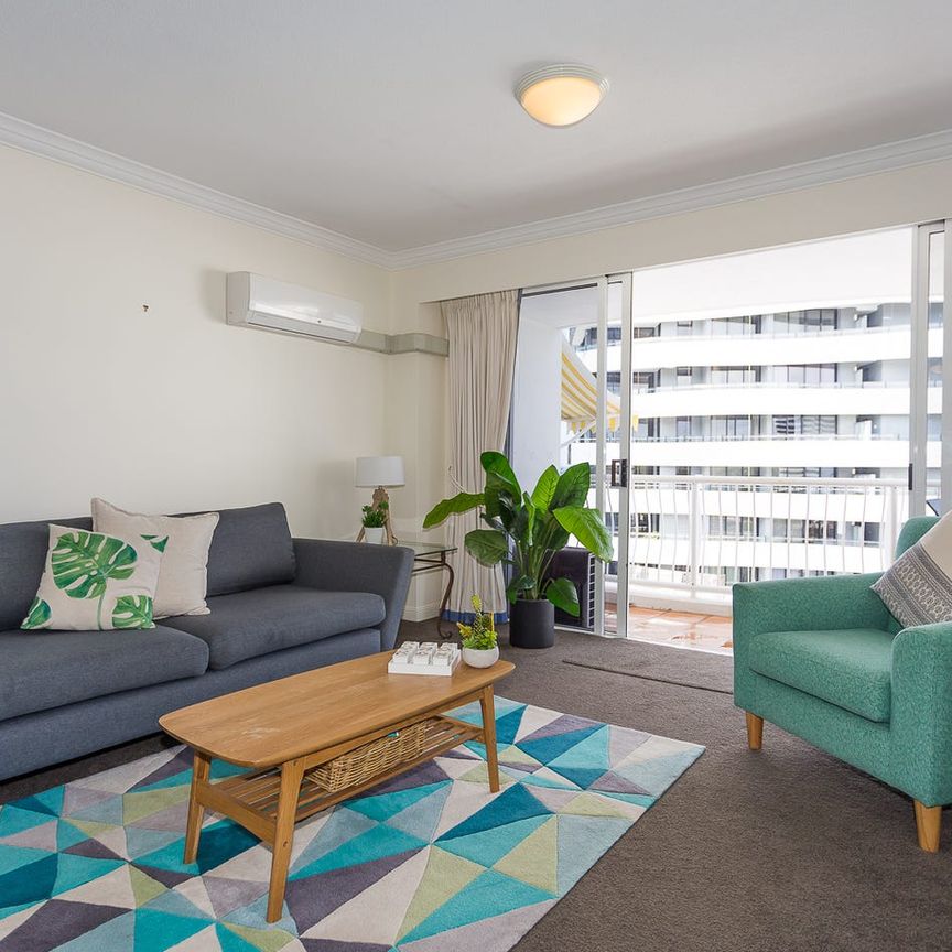 Fully Furnished 8th Floor Corner Apartment - Photo 1