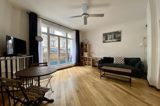Appartement à louer rue Tardieu, Paris 18ème - Photo 1