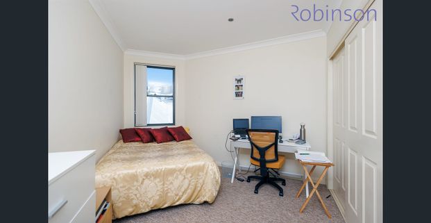 Two-bedroom townhouse offers modern living in a convenient and low-maintenance setting - Photo 1