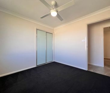 NEAR NEW 4 BEDROOM HOME - Photo 6