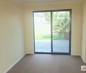 Practical 4-Bedroom Brick Home - Photo 3