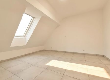 Traumhafte Dachgeschosswohnung – Erstbezug in hochwertig gebautem Wohnhaus - Klimaanlage - Moderne Küche - Gemeinschaftsgarten - Foto 5