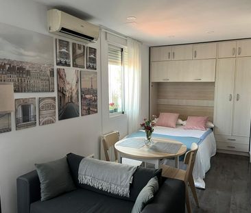 Ático duplex con terraza en el corazón de Madrid: luz, estilo y vid... - Photo 4