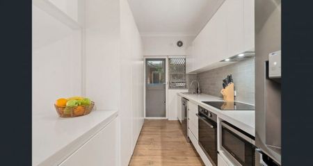 Sun-Filled, Renovated Apartment Just Steps from the Bay - Photo 5