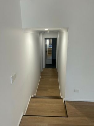 RENOVATED DUPLEX WITH POOL AND TENNIS COURT IN COMPLEX - Photo 1