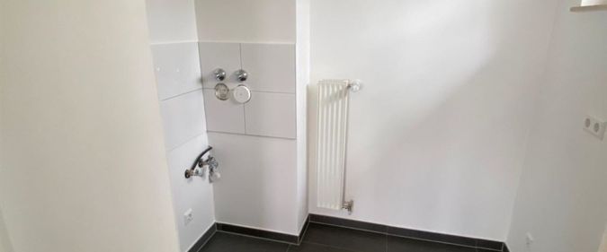 Hel­le 2‑Zim­mer-Woh­nung mit Balkon - Foto 1