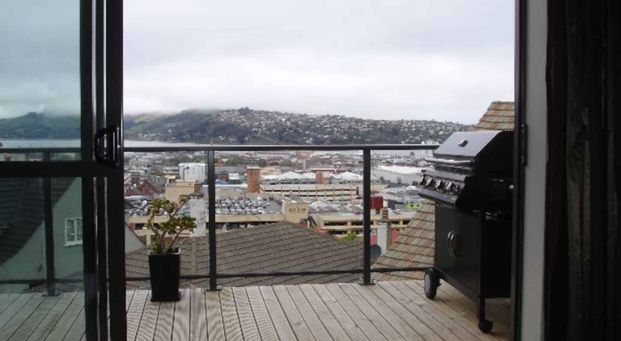 Executive City Living with Deck & City Views - Photo 1