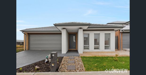 Modern Comfort In Beveridge - Photo 1