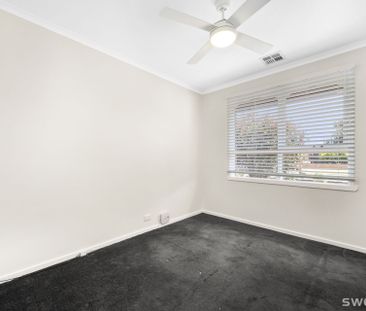 Conveniently positioned modern two bedroom unit with lock up garage - Photo 4