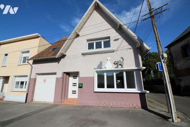 Maison avec jardin et garage. - Photo 1