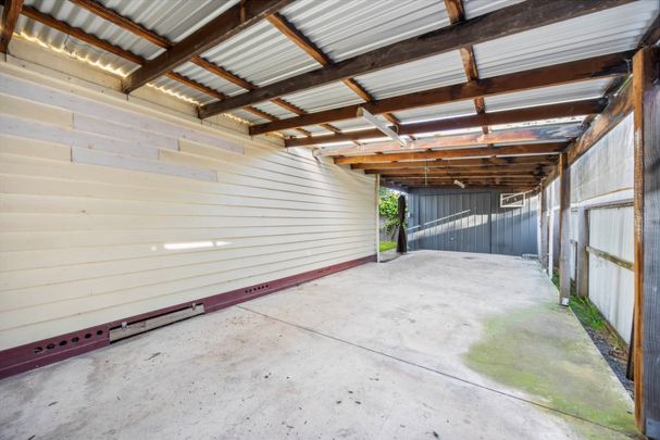 Four-Bedroom Family Home with Dual Driveways and Shedding - Photo 1