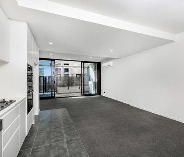 Sleek & Secure Apartment Close to Everything - Photo 1