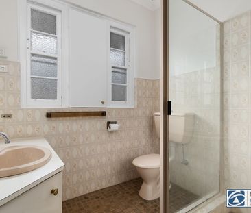 Charming CBD Cottage with Character & Sunlit Living - Photo 6