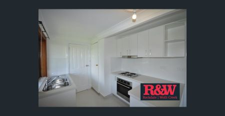 Conveniently Located One-Bedroom Semi with Study - Photo 5