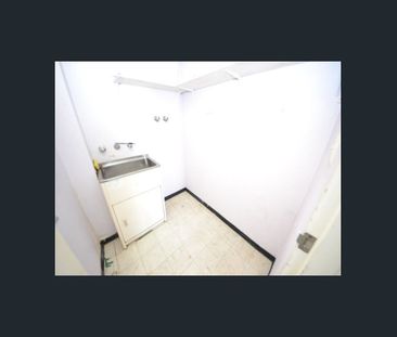 Large Unit, High Ceilings - Photo 2