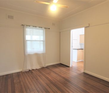 2 Bedroom Home with Sunroom, In A Great Position - Photo 2