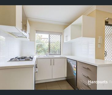 TOWNHOUSE WITH COMPLEX POOL - Photo 1