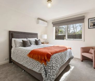 CHARMING VICTORIAN-INSPIRED HOME IN A BRIGHT, LOW MAINTENANCE GARDE... - Photo 2