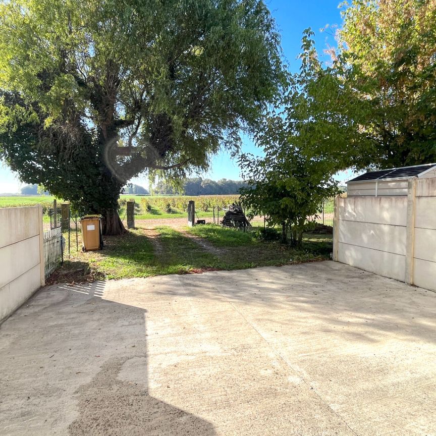 A LOUER MAISON DE TYPE 4 AVEC JARDIN - SECTEUR PUGNAC - Photo 1