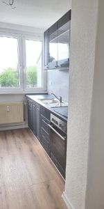 Sanierte Zweiraumwohnung mit Einbauküche - Foto 4