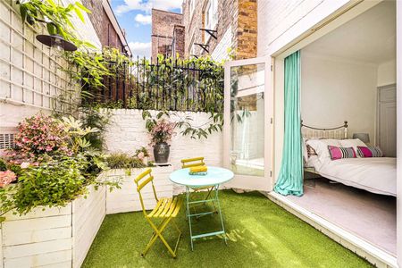 A charming one bedroom apartment with a private patio garden. - Photo 3