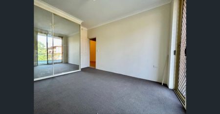 ""TWO BEDROOM SPLIT LEVEL APARTMENT WITH LOCK UP GARAGE"" - Photo 3