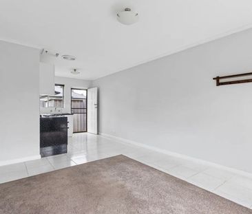 Well-Located 2-Bedroom Unit with Private Yard - Photo 2