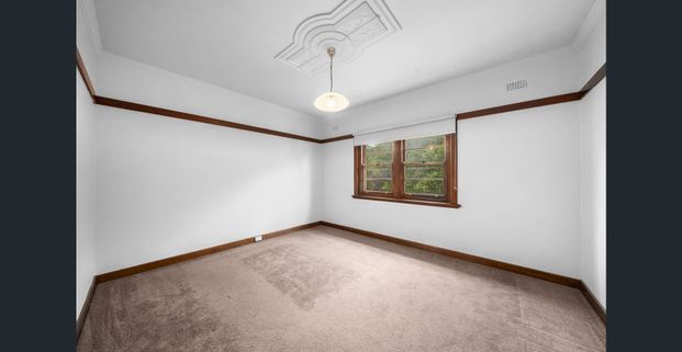 Top Floor Duplex Apartment with Private Balcony and Off Street Parking - Photo 1