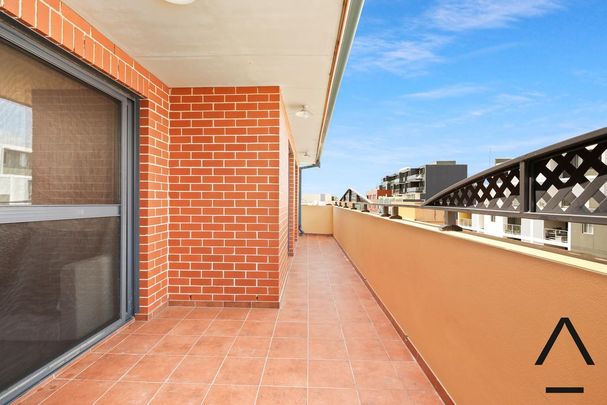 Centrally Situated, Private and Secure Penthouse — Three Bedroom, Two Bathroom Oasis in a Superb Location - Photo 1